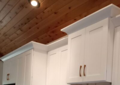 Trenton's cove crown molding on white shaker cabinets